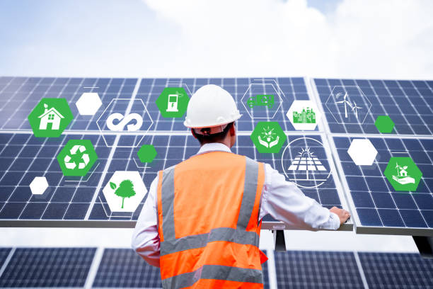 Businessman on a tour of solar power plants to check the operation of the power generation system. solar panels are an alternative electricity source to be sustainable resources in the future.